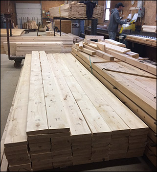 Lumber stacked in workshop